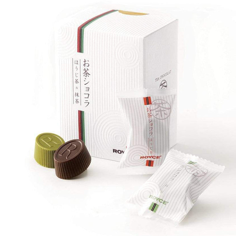 ROYCE' Chocolate - Tea Chocolat Hojicha & Matcha - Image shows a white box and packaged chocolates with accents of colors red and green. Visible words are Tea Chocolat and ROYCE'. On the left are green and brown chocolate cups engraved with the letter R.