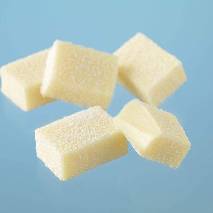 ROYCE' Chocolate - Nama Chocolate "White" - Image shows white blocks of chocolates with blue background.