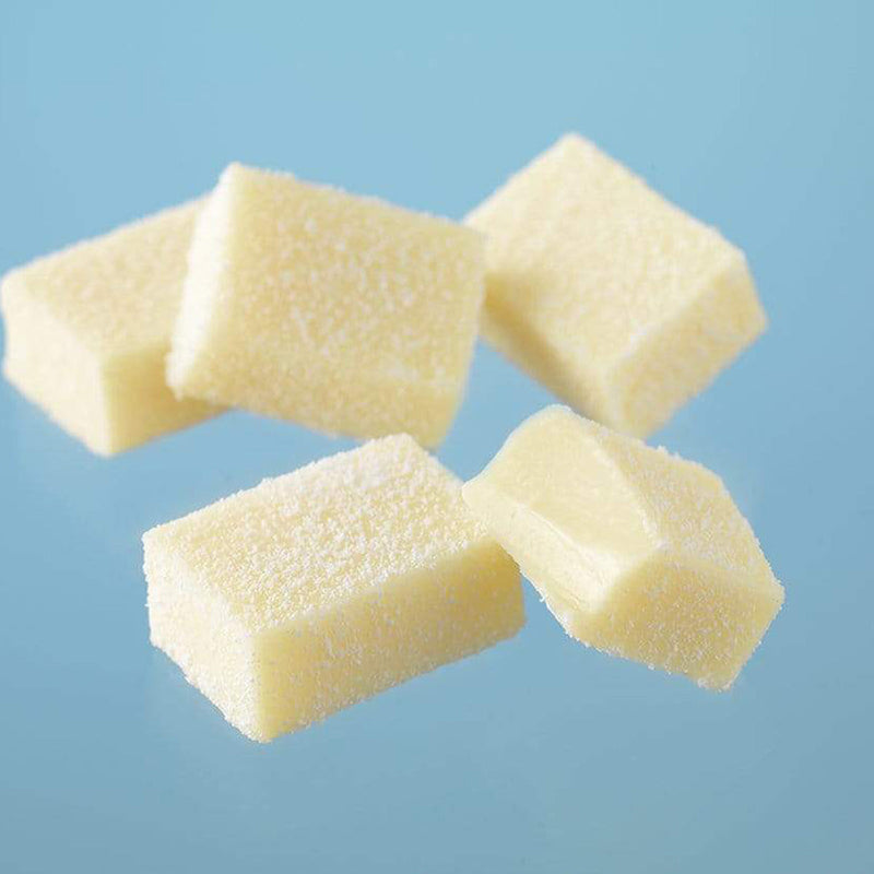 ROYCE' Chocolate - Nama Chocolate White - Image shows white blocks of chocolates with blue background.
